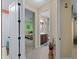Hallway with access to bedroom and bathroom at 224 Ariano Ave, Nokomis, FL 34275