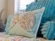 Close-up of decorative pillows on a bed at 224 Ariano Ave, Nokomis, FL 34275