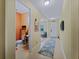 Bright entryway with tile flooring, powder room, and access to living areas at 224 Ariano Ave, Nokomis, FL 34275