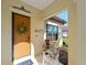 Front porch with rocking chair and spring wreath at 224 Ariano Ave, Nokomis, FL 34275