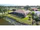 Backyard oasis with pool, screened enclosure & water view at 256 Royal Oak Way, Venice, FL 34292