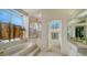 Bright bathroom with a walk-in shower and double sinks at 256 Royal Oak Way, Venice, FL 34292