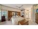 Main bedroom with built-in cabinets and en-suite bathroom, offering privacy at 256 Royal Oak Way, Venice, FL 34292