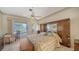 Spacious bedroom with large windows and built-in storage at 256 Royal Oak Way, Venice, FL 34292