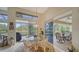 Bright breakfast nook with pool and patio view, perfect for relaxing mornings at 256 Royal Oak Way, Venice, FL 34292