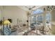 Cozy Gathering room with large windows and comfortable seating at 256 Royal Oak Way, Venice, FL 34292