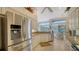 Modern kitchen with stainless steel appliances and granite countertops at 256 Royal Oak Way, Venice, FL 34292