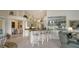 Kitchen features granite countertops, breakfast bar, and built-in cabinetry at 256 Royal Oak Way, Venice, FL 34292