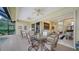 Relaxing pool patio with seating area and view of the pool at 256 Royal Oak Way, Venice, FL 34292