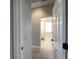Bathroom with double vanity, tile floor, and access to another bathroom at 2890 Whispering Pine Ln, North Port, FL 34287