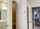 Bathroom with shower stall, tile flooring, and access to another room at 2890 Whispering Pine Ln, North Port, FL 34287