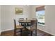 Charming dining area with round table and four chairs at 2949 Jaylene Rd, North Port, FL 34288