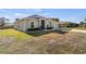 One story home with attached garage, landscaping and large yard at 2949 Jaylene Rd, North Port, FL 34288