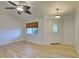 Living room with hardwood floor and ceiling fan at 3187 Galiot Rd, Venice, FL 34293