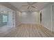 Spacious office with light grey walls and wood-look flooring at 3187 Galiot Rd, Venice, FL 34293