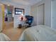 Bedroom with two twin beds and an adjacent workspace at 3300 Blue Jay Ln, Englewood, FL 34224