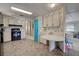 Clean kitchen with black appliances and updated countertops at 3300 Blue Jay Ln, Englewood, FL 34224