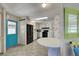 Bright kitchen with black appliances and a breakfast nook at 3300 Blue Jay Ln, Englewood, FL 34224