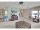 Living room with TV and comfy seating at 3300 Blue Jay Ln, Englewood, FL 34224