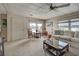 Spacious living room with comfy seating and view at 3300 Blue Jay Ln, Englewood, FL 34224