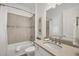 Bathroom with a bathtub, shower, and modern vanity with a quartz countertop at 400 Maraviya Blvd, Nokomis, FL 34275