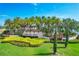Toscana Isles community entrance with lush landscaping at 400 Maraviya Blvd, Nokomis, FL 34275