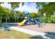 playground with slides and climbing structures at 400 Maraviya Blvd, Nokomis, FL 34275