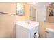 Small bathroom with white vanity and toilet at 408 Cerromar S Cir # 132, Venice, FL 34293