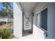 Building hallway with access to condo units at 408 Cerromar S Cir # 132, Venice, FL 34293