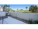 Small patio with seating area and golf course view at 408 Cerromar S Cir # 132, Venice, FL 34293