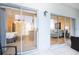 View from patio shows condo bedroom and living room at 408 Cerromar S Cir # 132, Venice, FL 34293