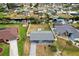 Aerial view of house and neighborhood with canal at 4310 Albacore Cir, Port Charlotte, FL 33948