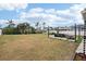 Large backyard with patio furniture and shade sail at 4310 Albacore Cir, Port Charlotte, FL 33948