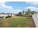 Spacious backyard with patio furniture and shade sail at 4310 Albacore Cir, Port Charlotte, FL 33948