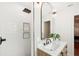 Updated bathroom with a large mirror and modern fixtures at 4310 Albacore Cir, Port Charlotte, FL 33948