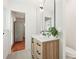 Modern bathroom with a floating vanity and walk-in shower at 4310 Albacore Cir, Port Charlotte, FL 33948