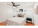 Bright bedroom with a queen bed and hardwood floors at 4310 Albacore Cir, Port Charlotte, FL 33948