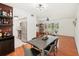 Open concept dining room with a large table and kitchen view at 4310 Albacore Cir, Port Charlotte, FL 33948