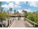 Wooden dock extending over calm water at 4310 Albacore Cir, Port Charlotte, FL 33948