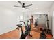 Home gym featuring an exercise bike and weight equipment at 4310 Albacore Cir, Port Charlotte, FL 33948