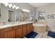 Double vanity bathroom with soaking tub and walk-in shower at 438 Grand Preserve Cv, Bradenton, FL 34212