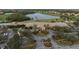 Community clubhouse with parking and golf course view at 438 Grand Preserve Cv, Bradenton, FL 34212
