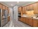 Well-equipped kitchen with stainless steel appliances and ample cabinetry at 438 Grand Preserve Cv, Bradenton, FL 34212