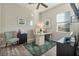 Home office with desk, chair, and ample natural light at 438 Grand Preserve Cv, Bradenton, FL 34212
