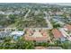 Aerial view of property showing building layout, landscaping, and neighborhood context at 440 Palmetto Ct # 3, Venice, FL 34285