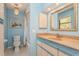 Bathroom with tub, vanity, and mirror at 440 Palmetto Ct # 3, Venice, FL 34285