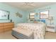 Main bedroom with king-size bed and dresser at 440 Palmetto Ct # 3, Venice, FL 34285