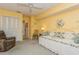 Guest bedroom with daybed and access to bathroom at 440 Palmetto Ct # 3, Venice, FL 34285