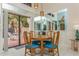Bright dining area with sliding doors to the patio at 440 Palmetto Ct # 3, Venice, FL 34285
