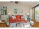Bright living room with comfy seating and a relaxing atmosphere at 440 Palmetto Ct # 3, Venice, FL 34285